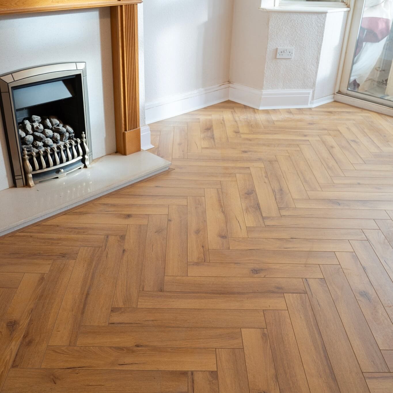 Oak Robust Natural Herringbone Laminate 12mm Fusion Flooring