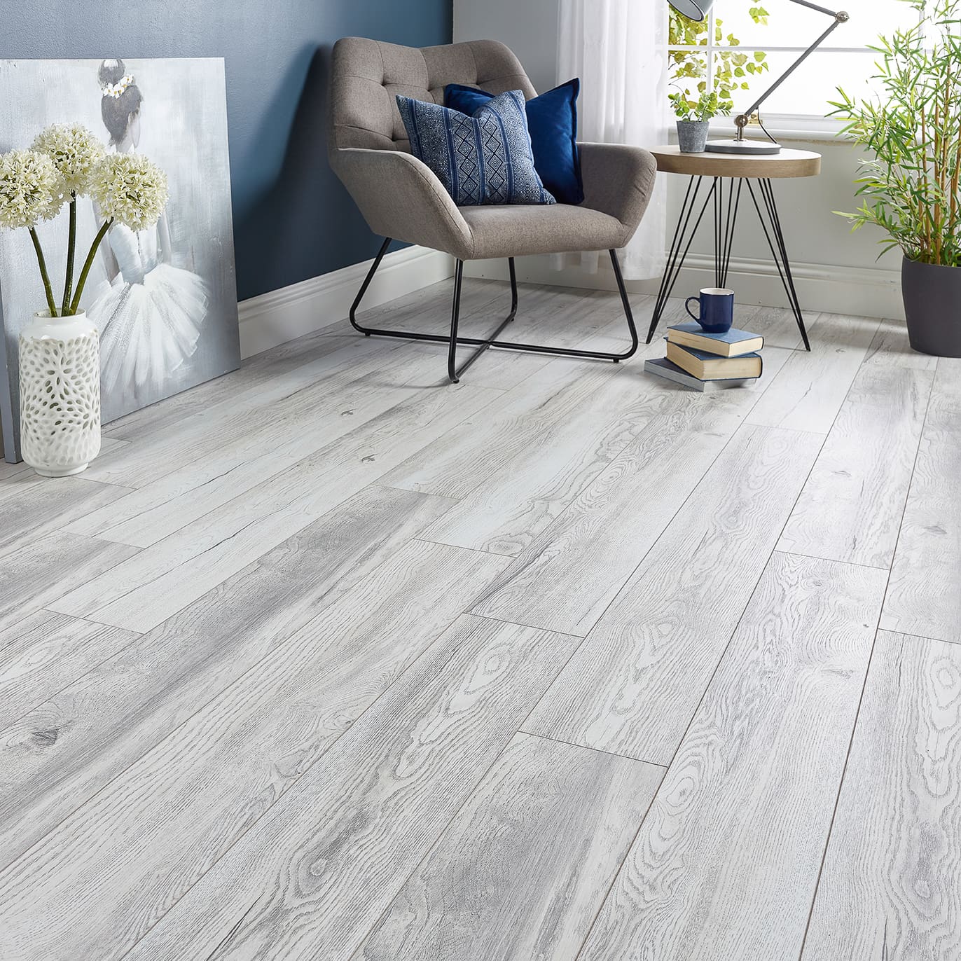 Vortex Girona Oak 12mm Laminate Flooring with grey tones and textured surface