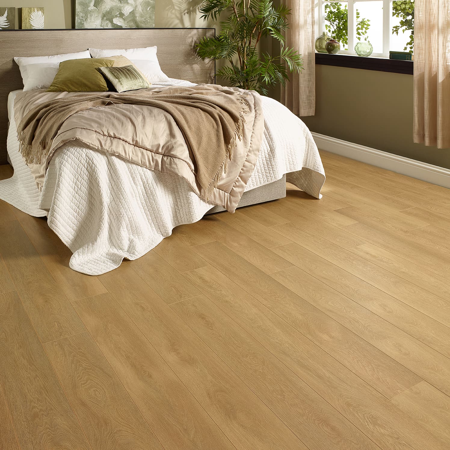 Madrid Oak 12mm Laminate Flooring with 4V Groove, showcasing warm oak tones and a realistic wood grain finish.