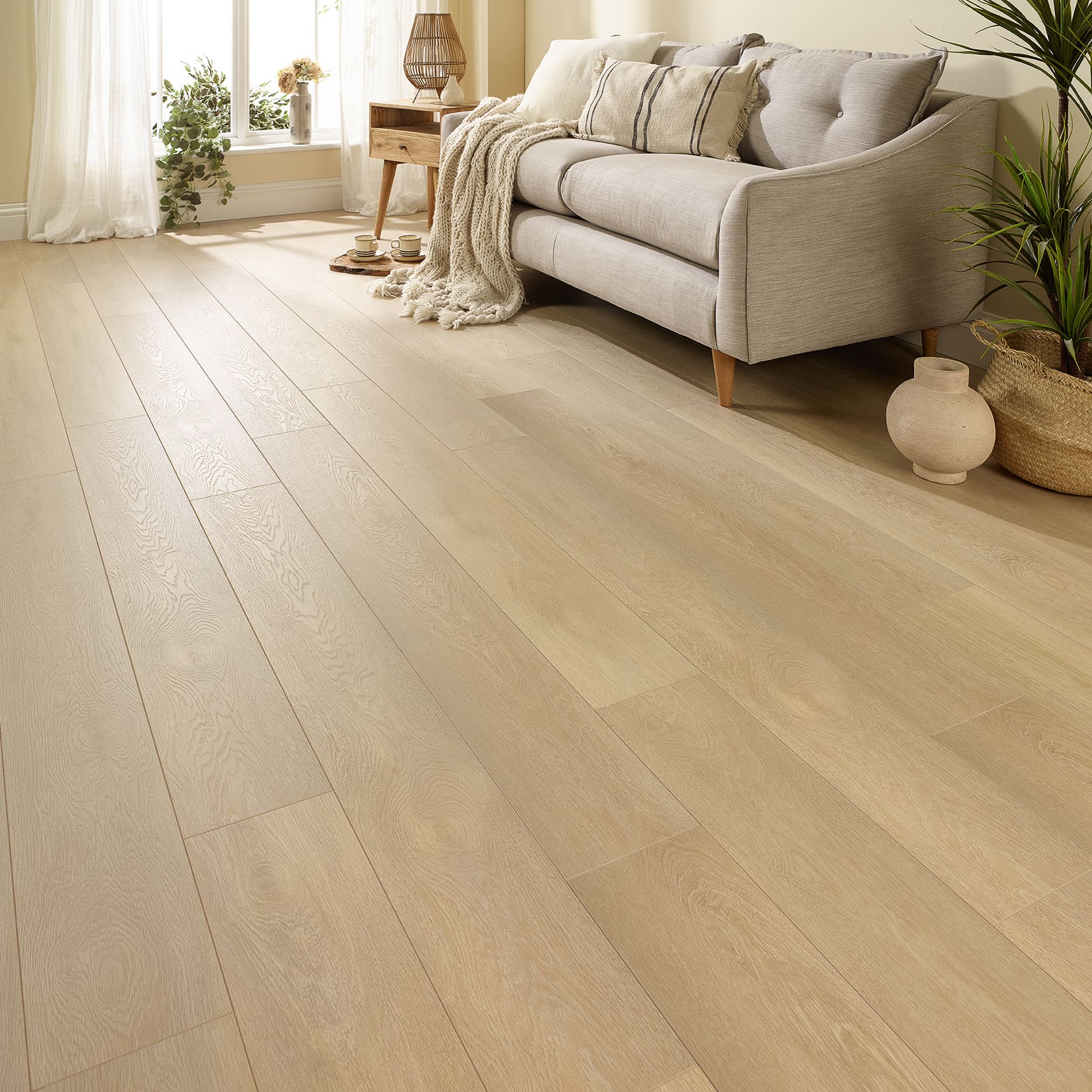 Murcia Oak 4V Groove Laminate Flooring with a light oak finish and textured wood grain.